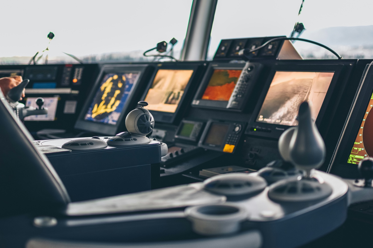 Navigation consoles on a ship bridge