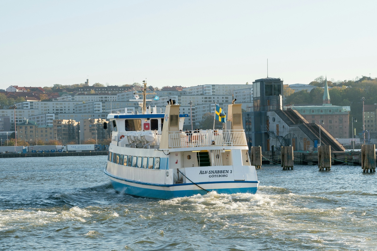 Passenger ferry departing a harbor